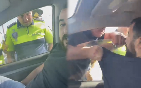 Polislə sürücü arasında daha bir insident - Video