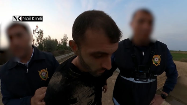 Polisin sinəsinə yerlədirilmiş kameraya düşən əməliyyatın görüntüləri (VİDEO)